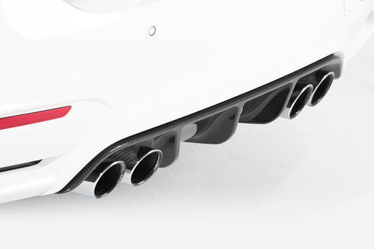 close-up of the black diffuser on the white rear bumper