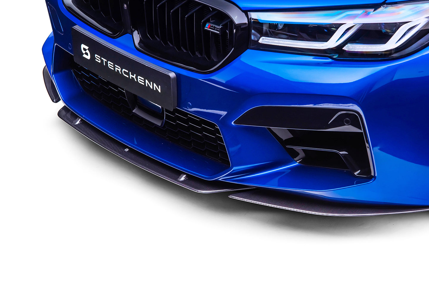 Blue BMW M5 (F90) LCI bumper with sterckenn logo