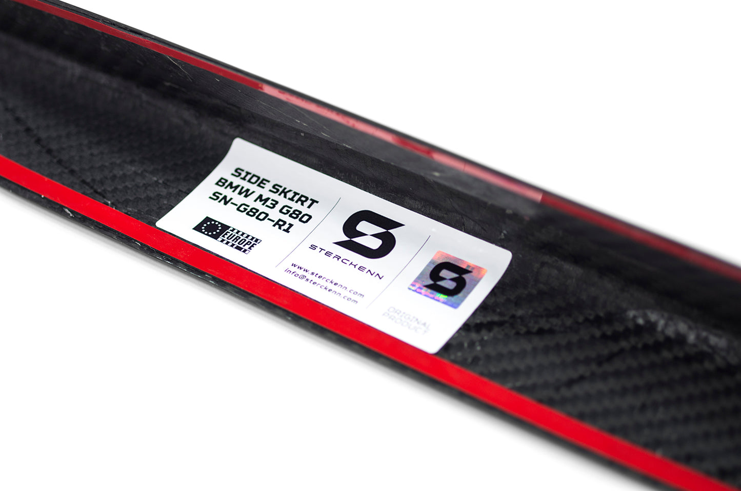 black car threshold with white sticker on a white background 